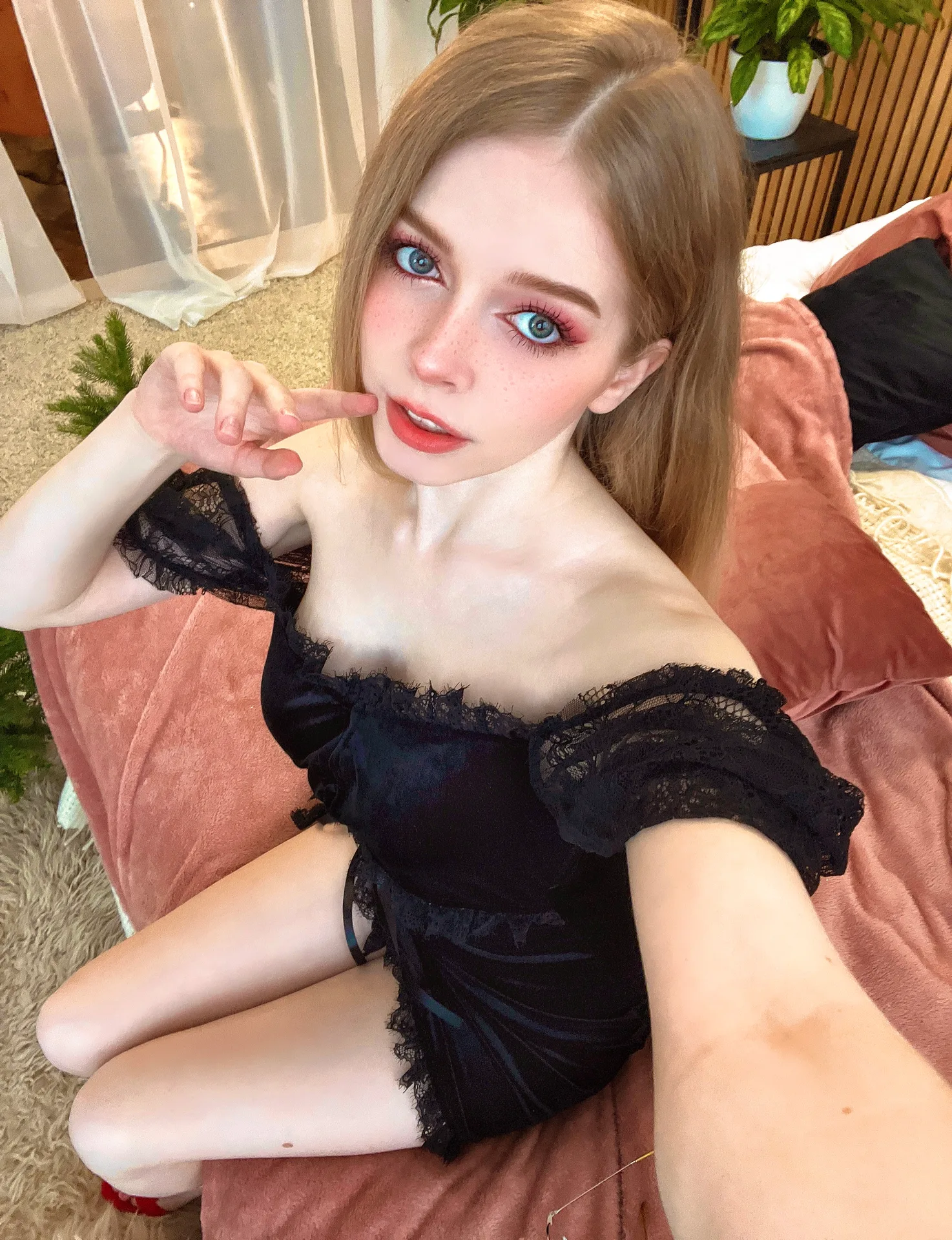 Black velvet dress on a bed