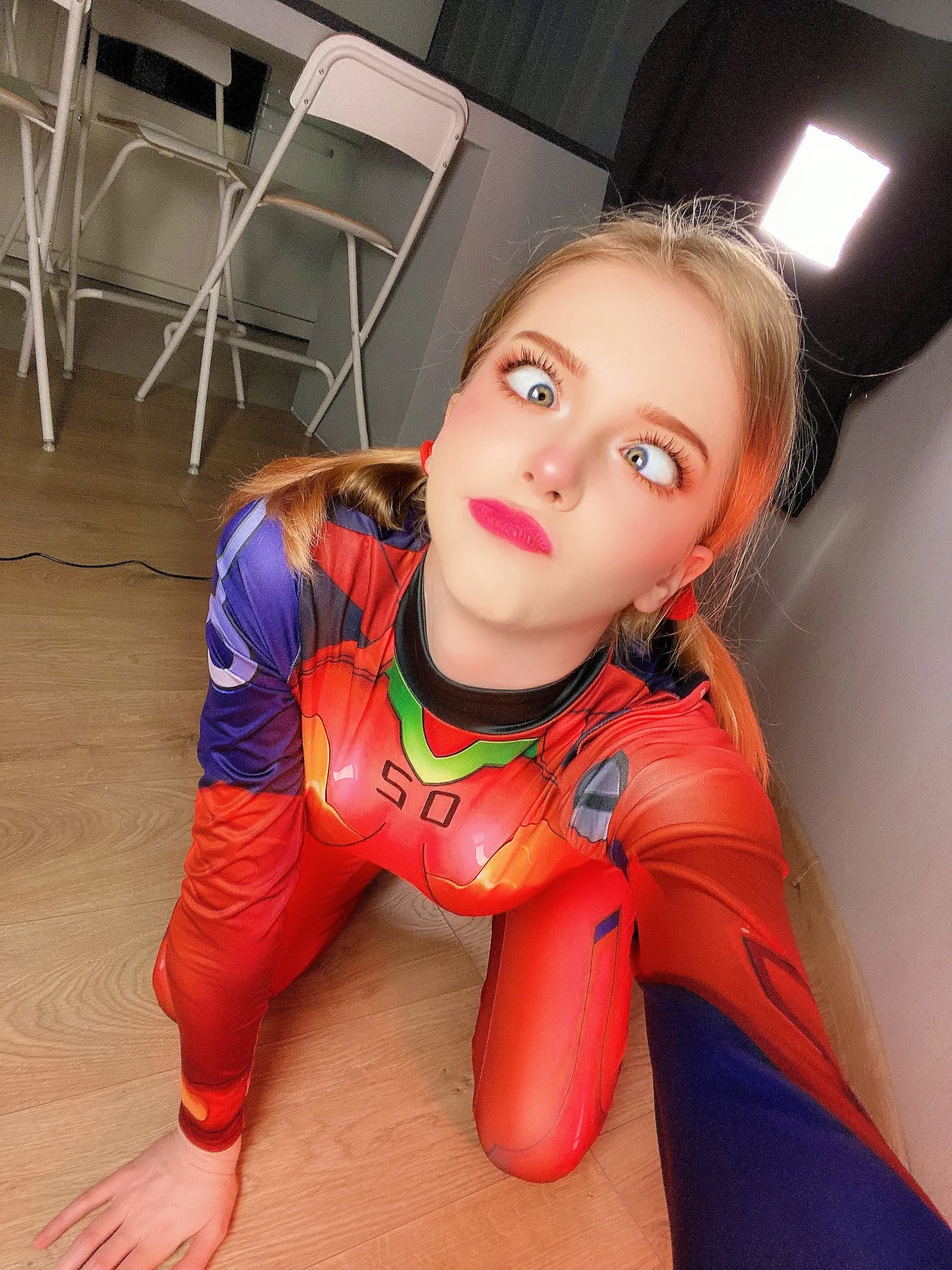 Orange plugsuit on the floor