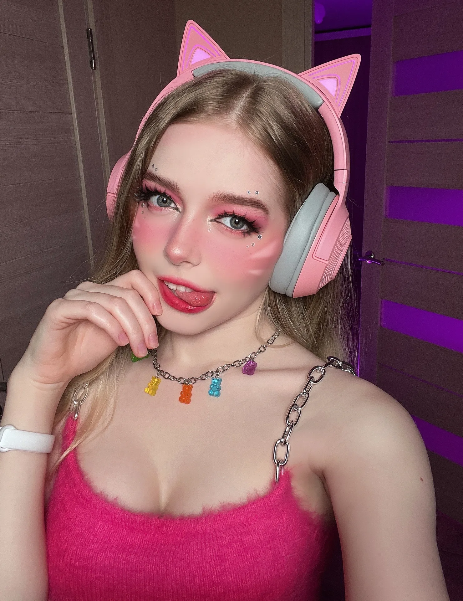 Pink knit top with cat headphones