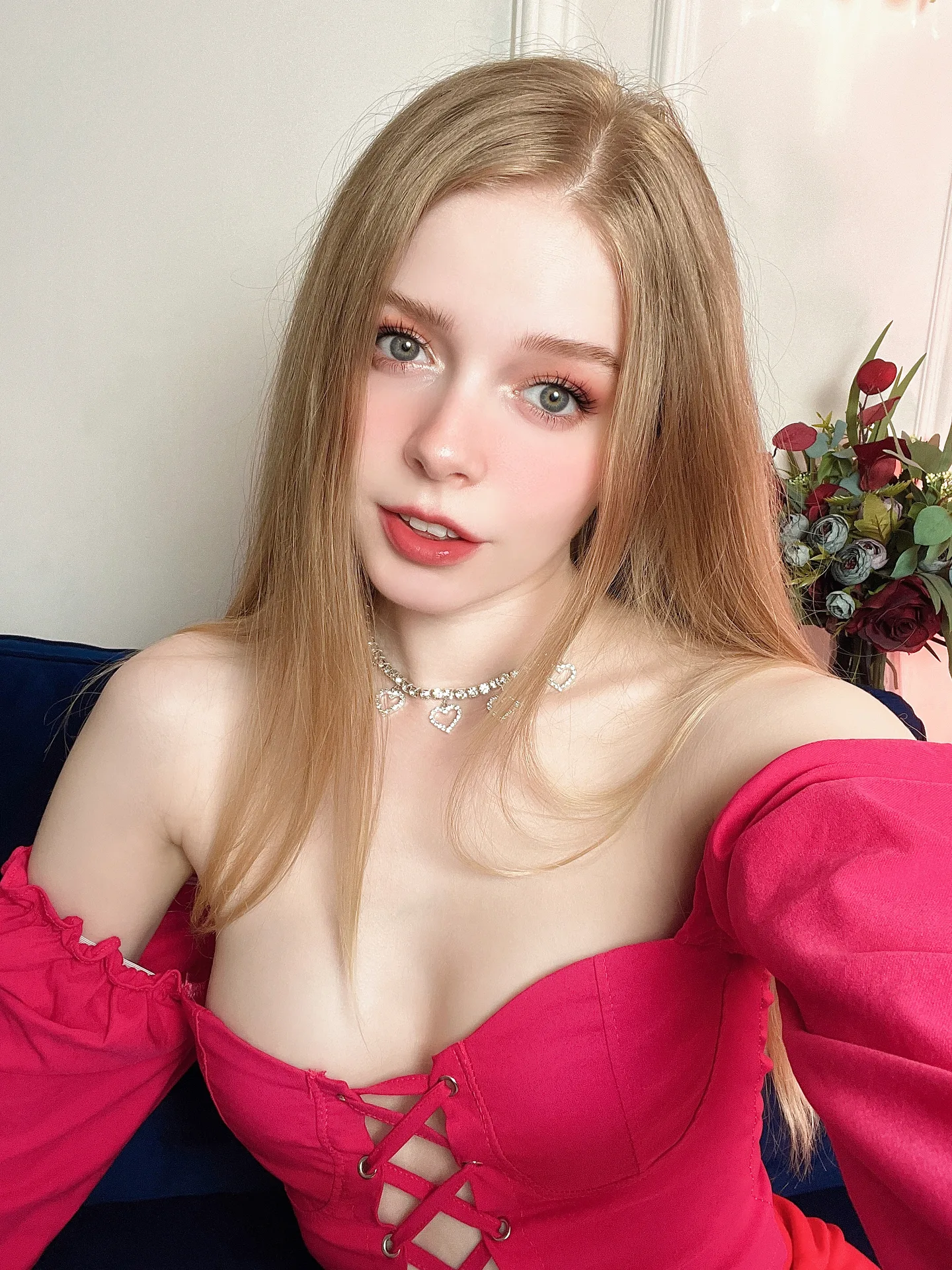 Pink off-shoulder top indoors