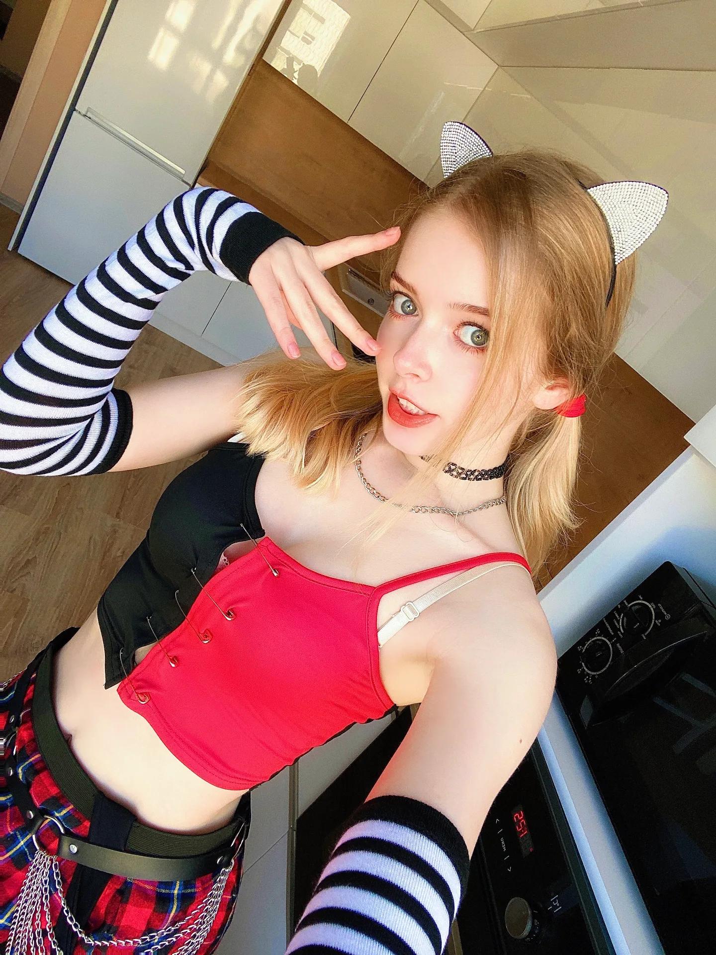 Red crop top and striped sleeves